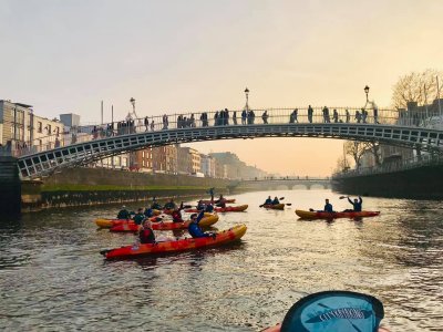 kayaks under a bridge 